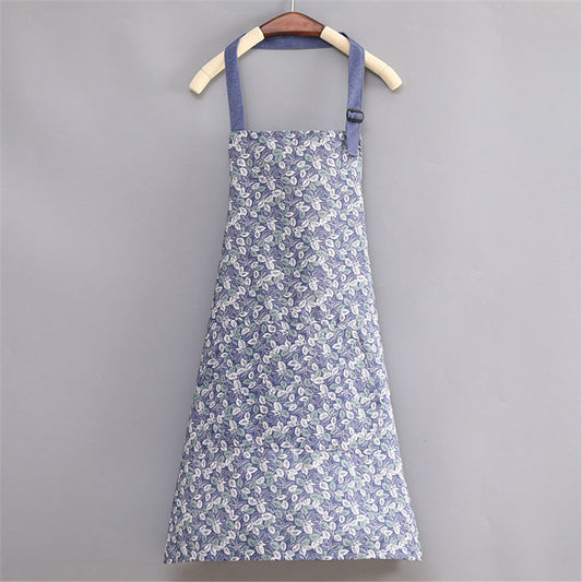 Blått forkle med blomster